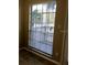 Bedroom window with blind shades allowing natural light and views of the exterior at 335 Wymore Rd # 201, Altamonte Springs, FL 32714