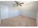 The angled bedroom features a ceiling fan at 4331 Willowcrest Ct, Orlando, FL 32826