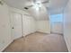 The bedroom has an angled ceiling with a window and closet at 4331 Willowcrest Ct, Orlando, FL 32826