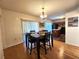 Open dining area with table and chairs, flows into the kitchen at 4331 Willowcrest Ct, Orlando, FL 32826