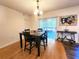 Bright dining room with modern decor, and sliding glass door at 4331 Willowcrest Ct, Orlando, FL 32826