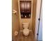 Bathroom featuring a toilet, vanity with storage, and tile flooring at 602 Lochsmere Ln, Orlando, FL 32828