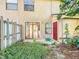 Back patio with a sliding glass door leading to living area at 606 Casa Park I Court, Winter Springs, FL 32708