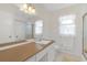 Bright bathroom featuring shower and modern sink at 632 Tranquil Oaks Ln, Oviedo, FL 32765