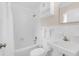 Clean bathroom with white fixtures and plenty of light at 632 Tranquil Oaks Ln, Oviedo, FL 32765