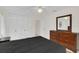 This bright bedroom features an entire wall of closet and dresser storage at 632 Tranquil Oaks Ln, Oviedo, FL 32765