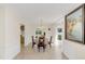 View of the dining room from the hallway showing the table and chairs at 632 Tranquil Oaks Ln, Oviedo, FL 32765