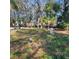 Spacious lot with mature trees offers privacy at 723 Jeffcoat St, Apopka, FL 32703