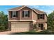 Two story home featuring stone accents, tan siding, attached two car garage and manicured lawn at 726 Meadows Edge Pl, Lake Wales, FL 33859