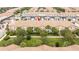 Aerial view of the Windsor at Westside community featuring townhomes and lush landscaping at 8948 Adriatico Ln, Kissimmee, FL 34747