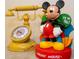 A Mickey Mouse figurine and a rotary telephone-themed clock at 8948 Adriatico Ln, Kissimmee, FL 34747