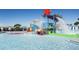 Community water park featuring slides, splash zone, and playful water features for Gathering fun at 8948 Adriatico Ln, Kissimmee, FL 34747