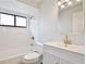 Bathroom featuring white tiles, modern fixtures and a combined shower and tub at 9913 Peddlers Way, Orlando, FL 32817