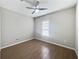 An empty bedroom with tiled floors, crown molding, light colored walls and natural light at 1038 Commuter Dr, Deltona, FL 32738