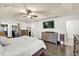 Cozy bedroom featuring wood-look floors and an entertainment center at 12991 Sw 72Nd Terrace Rd, Ocala, FL 34473