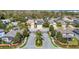 An aerial view of a gated community with sidewalks and manicured landscaping shows a lovely place to call home at 137 Kays Landing Dr, Sanford, FL 32771