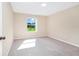 Bedroom with neutral carpeting features natural light from large window at 137 Kays Landing Dr, Sanford, FL 32771