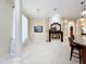 View of living room featuring fireplace, artwork, and bright natural light at 1502 Hempel Ave, Windermere, FL 34786