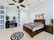 Spacious main bedroom boasts a tray ceiling, built-in shelves, and an inviting layout at 1502 Hempel Ave, Windermere, FL 34786