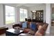 Living room with a view into the dining area, neutral colors, and lots of light at 1746 Golfview Drive, Kissimmee, FL 34746