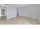 This bedroom has neutral paint and tile floor at 1897 Caralee Blvd # 2, Orlando, FL 32822