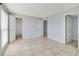 Bedroom featuring tile flooring and a closet at 1897 Caralee Blvd # 2, Orlando, FL 32822