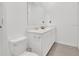 Bright bathroom with dual sinks, ample counter space, and modern fixtures at 1934 Pond Pine Ct, Haines City, FL 33844