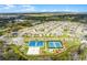 Aerial photograph displays well-maintained community sports courts and a Gathering-friendly neighborhood at 1982 Cricket Cradle Dr, Kissimmee, FL 34746