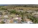 Overhead view of a property highlighting the buildings, trees, and expansive fields in the scenic surroundings at 204 Brooks Rd, Frostproof, FL 33843