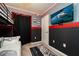 Themed bedroom with bunk beds, storm trooper helmets, and red neon lights at 207 Jetty Way, Davenport, FL 33897