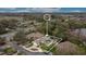 Aerial view of property boundaries, landscaping, the pool, and the paver driveway at 210 Laurel Park Ct, Winter Park, FL 32792