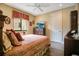 Comfortable bedroom featuring a ceiling fan and TV for relaxing evenings at 210 Laurel Park Ct, Winter Park, FL 32792