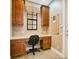 Functional home office with custom built-ins, desk space, and natural light at 210 Laurel Park Ct, Winter Park, FL 32792