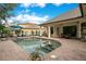 A lovely pool featuring inset stools and a patio area for entertaining and relaxation at 210 Laurel Park Ct, Winter Park, FL 32792