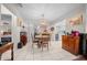 Dining area with traditional furnishings and a seamless transition to the outdoor space at 212 Glenn St, Leesburg, FL 34748