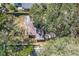 Aerial view of the home showing the roof and some of the mature landscaping at 213 James Dr, Winter Garden, FL 34787