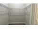 Walk-in closet featuring metal shelving for optimal storage and organization at 2132 Limestone Trl, Kissimmee, FL 34747