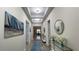 Inviting foyer with decorative mirrors, a blue rug, and recessed lighting leading into the home at 2132 Limestone Trl, Kissimmee, FL 34747