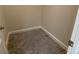 Small storage area with neutral walls and tiled flooring at 2132 Limestone Trl, Kissimmee, FL 34747