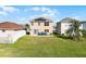 The home features a spacious lawn, perfect for relaxing and outdoor activities at 259 Southbridge Cir, Kissimmee, FL 34744