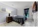 Bedroom featuring tile floors, a twin bed, dark curtains and a TV at 2957 Birmingham Blvd, Orlando, FL 32829