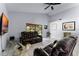 Bright living room featuring tile floors, vaulted ceiling, ceiling fan and sliding glass door at 2957 Birmingham Blvd, Orlando, FL 32829