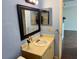 Bright bathroom featuring a vanity with a sink at 3008 Parkway Blvd # 302, Kissimmee, FL 34747