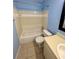 Cozy bathroom featuring a shower-tub combo and vanity at 3008 Parkway Blvd # 302, Kissimmee, FL 34747