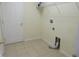 Empty laundry room with tile flooring, and washer and dryer hook-ups at 318 Habitat Way, Sanford, FL 32773