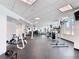 Spacious, brightly lit gym featuring modern exercise equipment and a large window offering scenic views during your workout at 322 E Central Blvd # 1612, Orlando, FL 32801