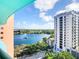 Scenic view overlooking a serene lake, capturing the essence of waterfront living from the balcony at 322 E Central Blvd # 1612, Orlando, FL 32801