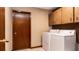 Laundry room featuring side by side washer and dryer at 4124 Winderlakes Dr, Orlando, FL 32835