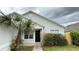 This home features a well-maintained lawn, nice landscaping and a covered entryway at 458 Lancers Dr, Winter Springs, FL 32708