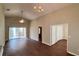 Spacious living room featuring high ceilings, wood floors and glass sliding doors to the patio at 458 Lancers Dr, Winter Springs, FL 32708